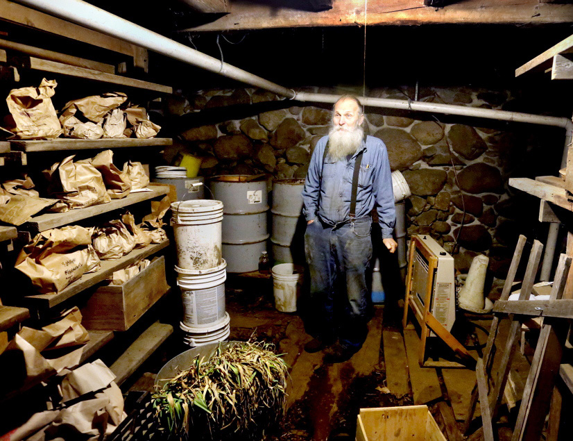 Will Bonsall in seed storage room