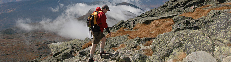 hiker ascends Mt. Washington