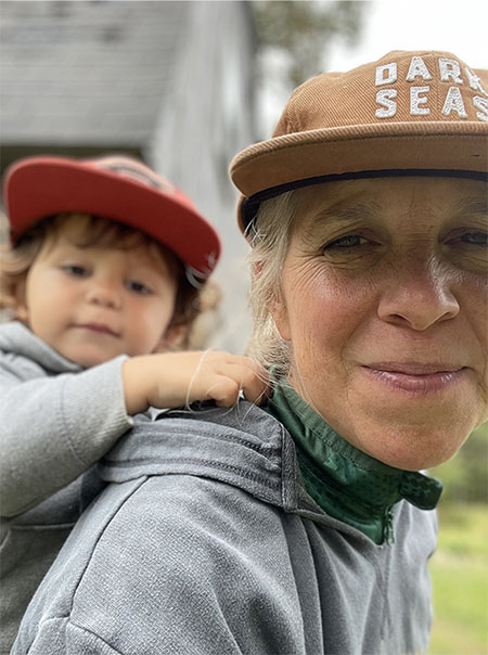 Amy Beal with grandson riding piggyback